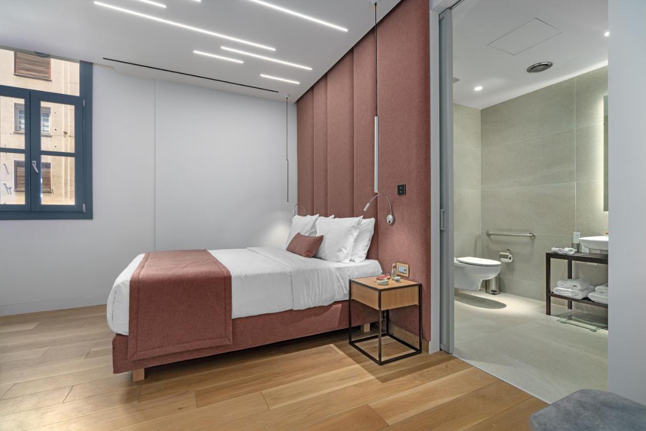 Hellenic Vibes Smart Hotel Ateny Zewnętrze zdjęcie A bedroom at the hotel